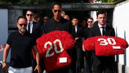 Liverpool's captain Virgil van Dijk and left back Andy Robertson arrive at the funeral ceremony of their former teammate Diogo Jota and his brother André Silva.