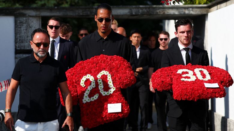 Liverpool's captain Virgil van Dijk and Liverpool's player Andrew Robertson arrive on the day of the funeral ceremony of Liverpool's Portuguese soccer player Diogo Jota and his brother Andre Silva, who died in a car crash near Zamora, Spain, near the Chapel of the Resurrection, in Gondomar, Portugal, on July 5, 2025.