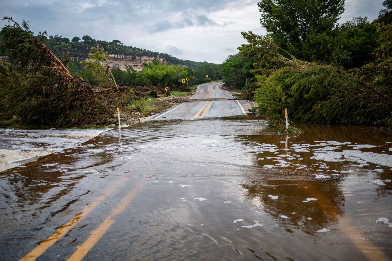 A portion of Highway 1340 is covered by the Guadalupe River in the aftermath of deadly flooding in Kerr County, Texas, on Monday.