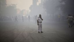 A policeman looks on during the extinguishing of a fire that broke out in a telecommunications building, which led to communications disruptions across the Egyptian capital, including people being unable to make phone calls, according to local media, in Cairo, Egypt, July 7, 2025.