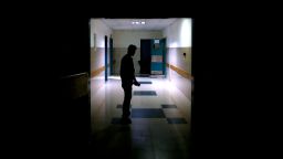 A Palestinian stands at Nasser Hospital, which Gaza's health ministry says is at risk of shutting down due to the Israeli blockade of fuel, as the ongoing shortage has already forced the facility to reduce its capacity, in Khan Younis in the southern Gaza Strip July 9, 2025. REUTERS/Hatem Khaled