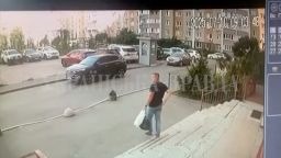 CCTV footage shows the SBU officer walking down the stairs moments before he was shot in Kyiv, Ukraine, on July 10.