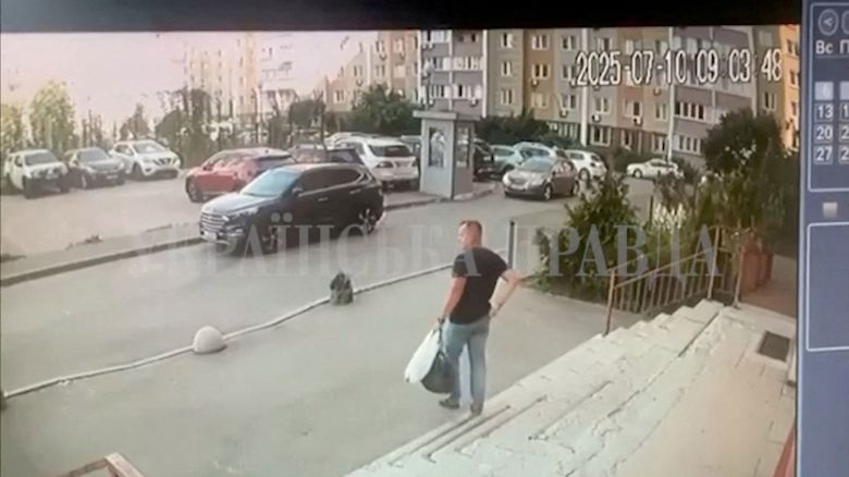 CCTV footage shows the SBU officer walking down the stairs moments before he was shot in Kyiv, Ukraine, on July 10.