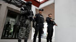 Security forces stand outside the National Court of Justice following a hearing for the extradition of Ecuadorean gang leader Jose Adolfo Macias, known as "Fito," who on Friday accepted the court's request to be extradited to the United States to face drug and gun charges, in Quito, Ecuador, July 11, 2025. REUTERS/Karen Toro