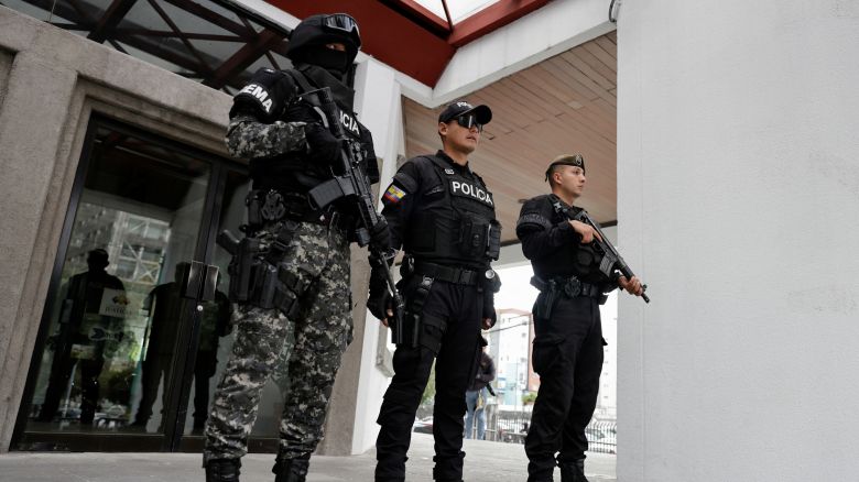 Security forces stand outside the National Court of Justice following a hearing for the extradition of Ecuadorean gang leader Jose Adolfo Macias, known as "Fito," who on Friday accepted the court's request to be extradited to the United States to face drug and gun charges, in Quito, Ecuador, July 11, 2025. REUTERS/Karen Toro