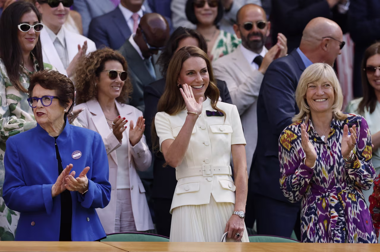 Catherine, Princess of Wales, attends the match. At left is tennis great Billie Jean King.