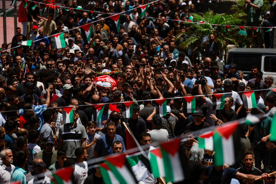 People carry the body of Saif Musallet during his funeral near Ramallah, in the Israel-occupied West Bank on Sunday.