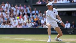 Jul 13, 2025; Wimbledon, United Kingdom; Jannik Sinner (ITA) hits a backhand against Carlos Alcaraz (ESP)(not pictured) in the gentlemen's' singles final of The Championships Wimbledon 2025 at All England Lawn Tennis and Croquet Club. Mandatory Credit: Geoff Burke-Imagn Images
