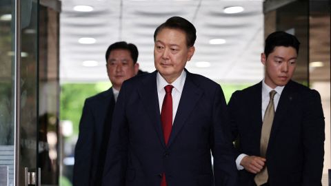 Former South Korean President Yoon Suk Yeol arrives at a court in Seoul, South Korea, to attend a hearing to review his arrest warrant requested by special prosecutors, on July 9, 2025.