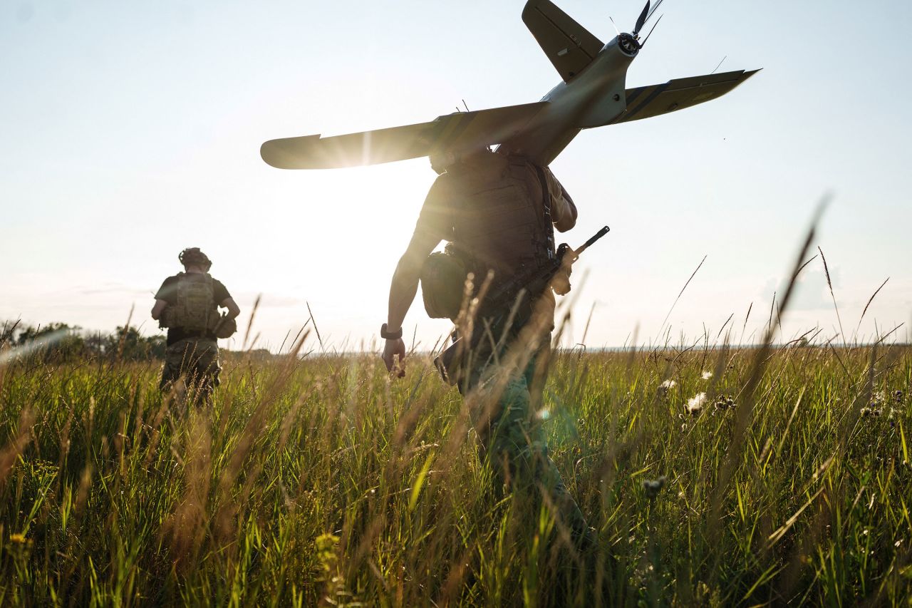 Service members of the 13th Operative Purpose Brigade of the National Guard of Ukraine prepare to launch a Ukrainian-made  reconnaissance drone toward a front line in Ukraine's Kharkiv region on July 20.