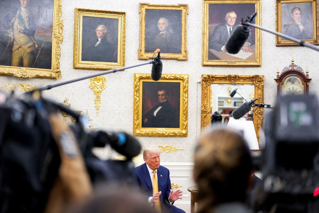 President Donald Trump speaks to members of the press during a Tuesday meeting at the White House.