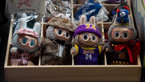 Counterfeit Labubu dolls are displayed for sale on the sidewalk in Manhattan, New York City, U.S., July 22, 2025.