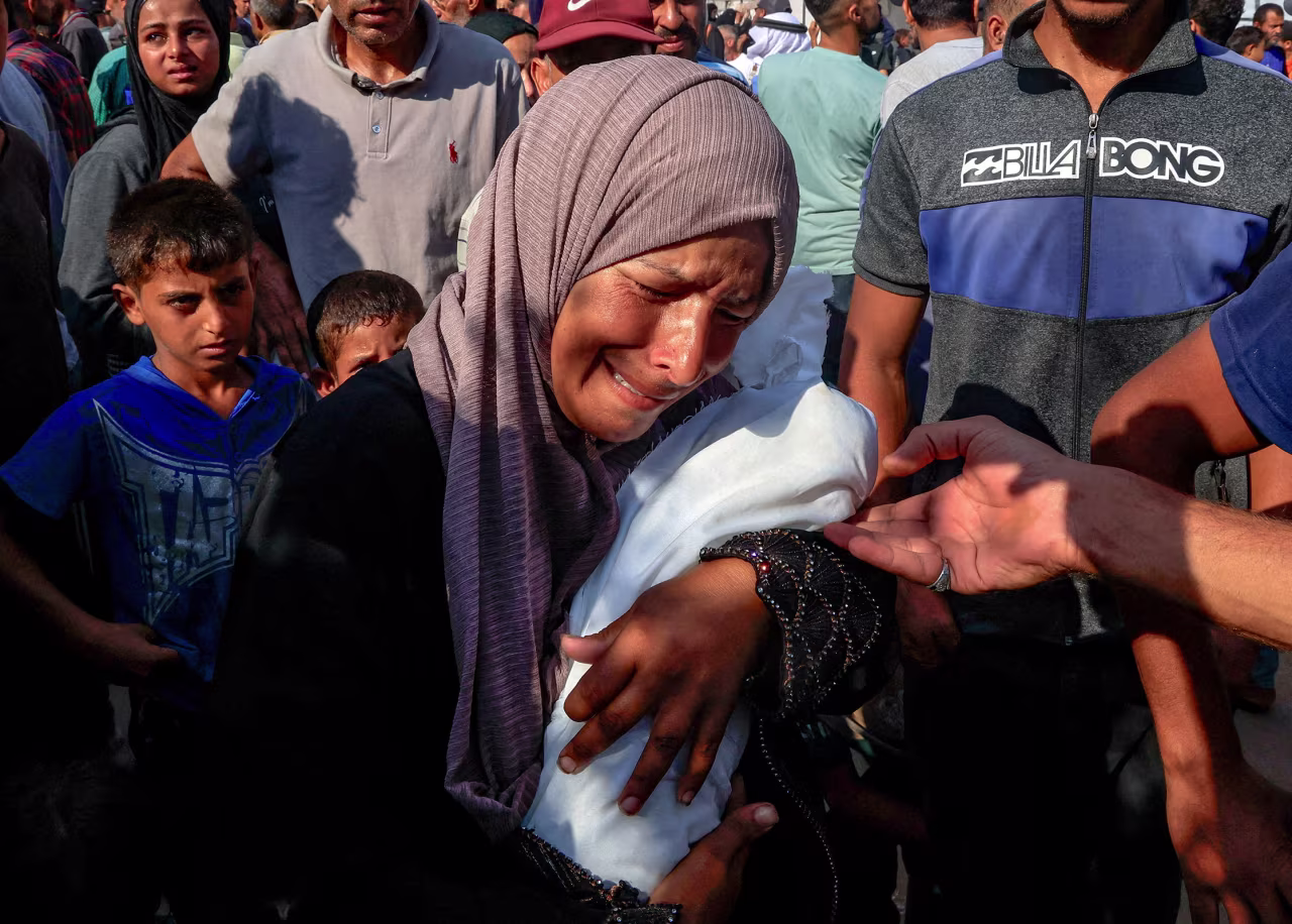 Alaa Al-Najjar mourns her 3-month-old baby, Yehia, at the Nasser Hospital in Khan Younis, Gaza, on July 20. Medics said Yehia died from malnutrition.