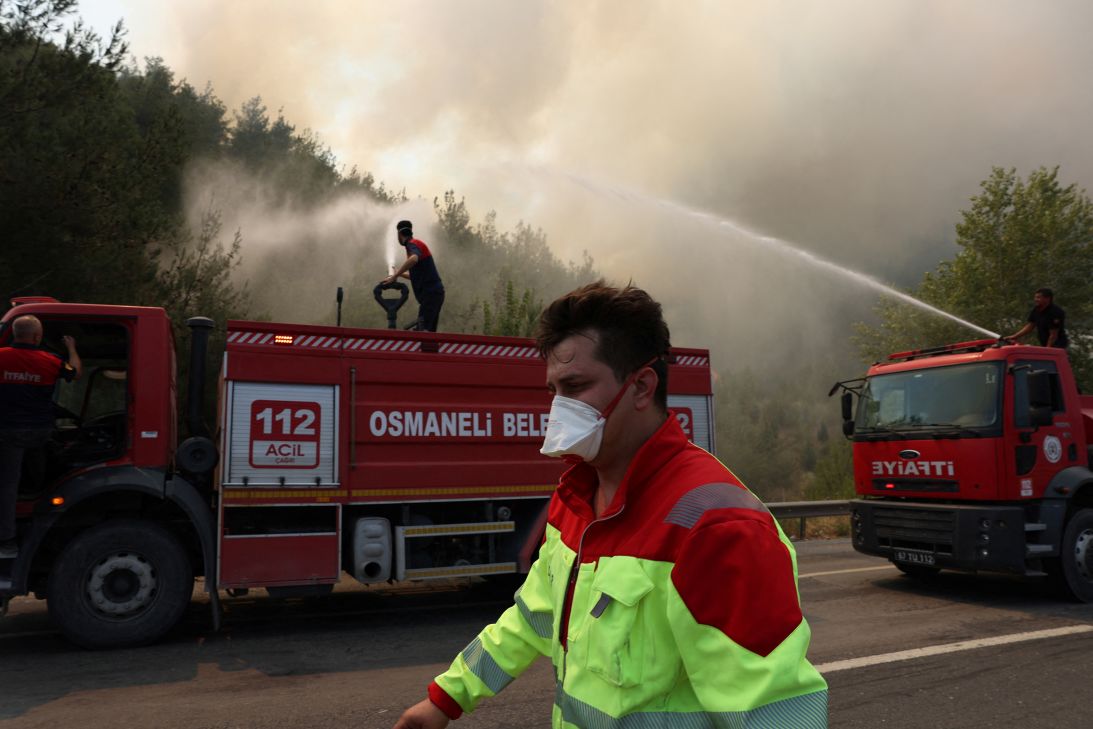 Firefighters respond to a wildfire near Osmaneli in the western Bilecik province of Turkey, July 24, 2025.