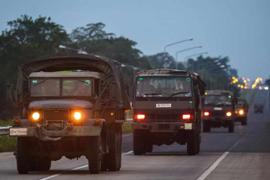 Army vehicles drive through Thailand's Buriram province after clashes along the Thai-Cambodian border on July 25, 2025.
