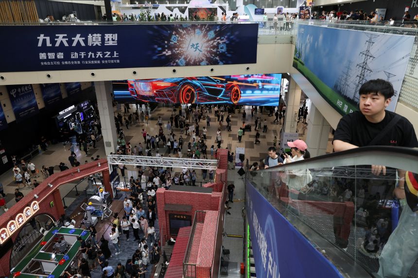 People visit the Shanghai World Expo Exhibition and Convention Center during the World Artificial Intelligence Conference in Shanghai, China July 26, 2025.