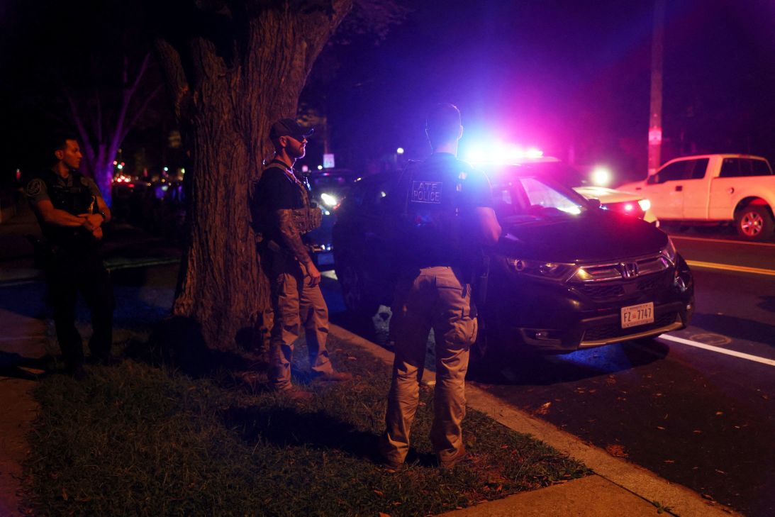Members of the Bureau of Alcohol, Tobacco, Firearms and Explosives assist the Metropolitan Police at a traffic stop in Washington, DC, on August 16.