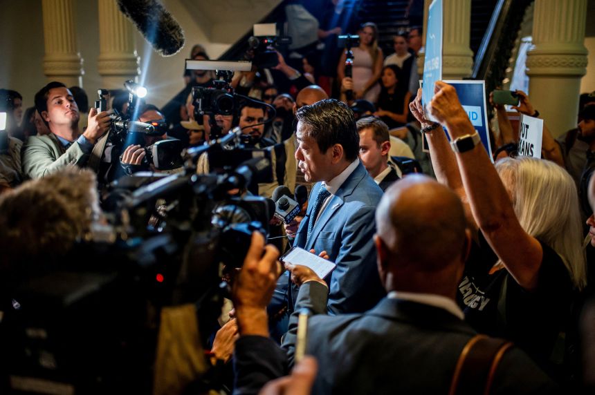 Democratic Representative Gene Wu speaks with the press at the Texas State Capitol in Austin, Texas on Monday.