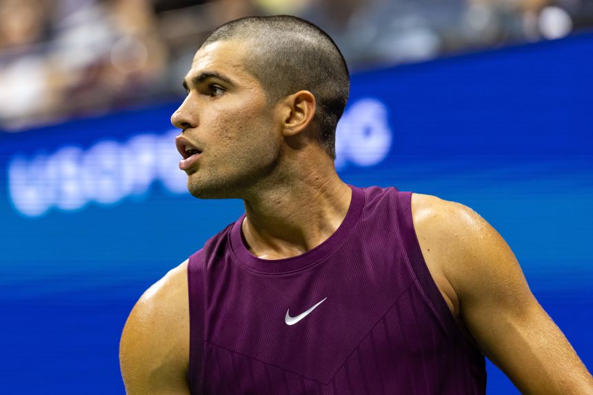 Carlos Alcaraz shows off his new trim during his first-round match at the US Open.