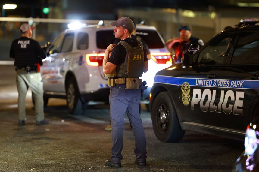 Police officers and federal agents patrol in the Kingman Park neighborhood of Washington, DC, on August 26.