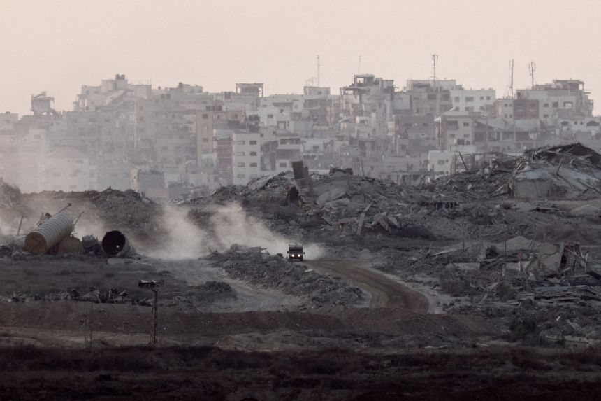 The vehicle will travel through past damage and debris in Gaza on Thursday.