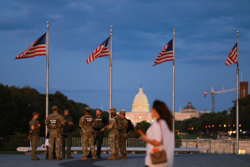 Police officers, DEA agents and members of South Carolina National Guard patrol the National Mall in Washington, DC, on September 1.