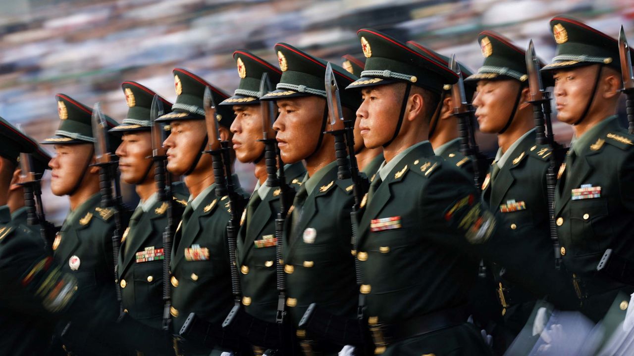 Soldiers stand during the rehearsal ahead of a military parade to mark the 80th anniversary of the end of World War Two, in Beijing, China, September 3, 2025. REUTERS/Tingshu Wang
