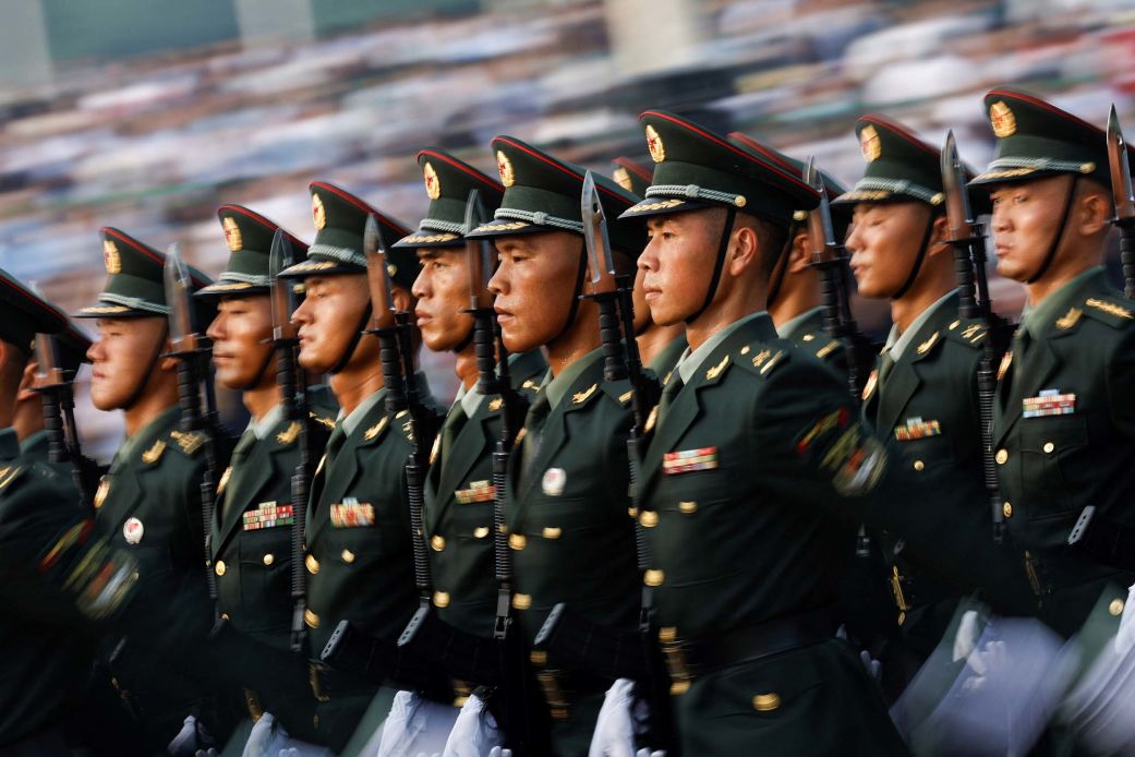 Soldiers stand during the rehearsal ahead of the military parade in Beijing, China, on Wednesday.