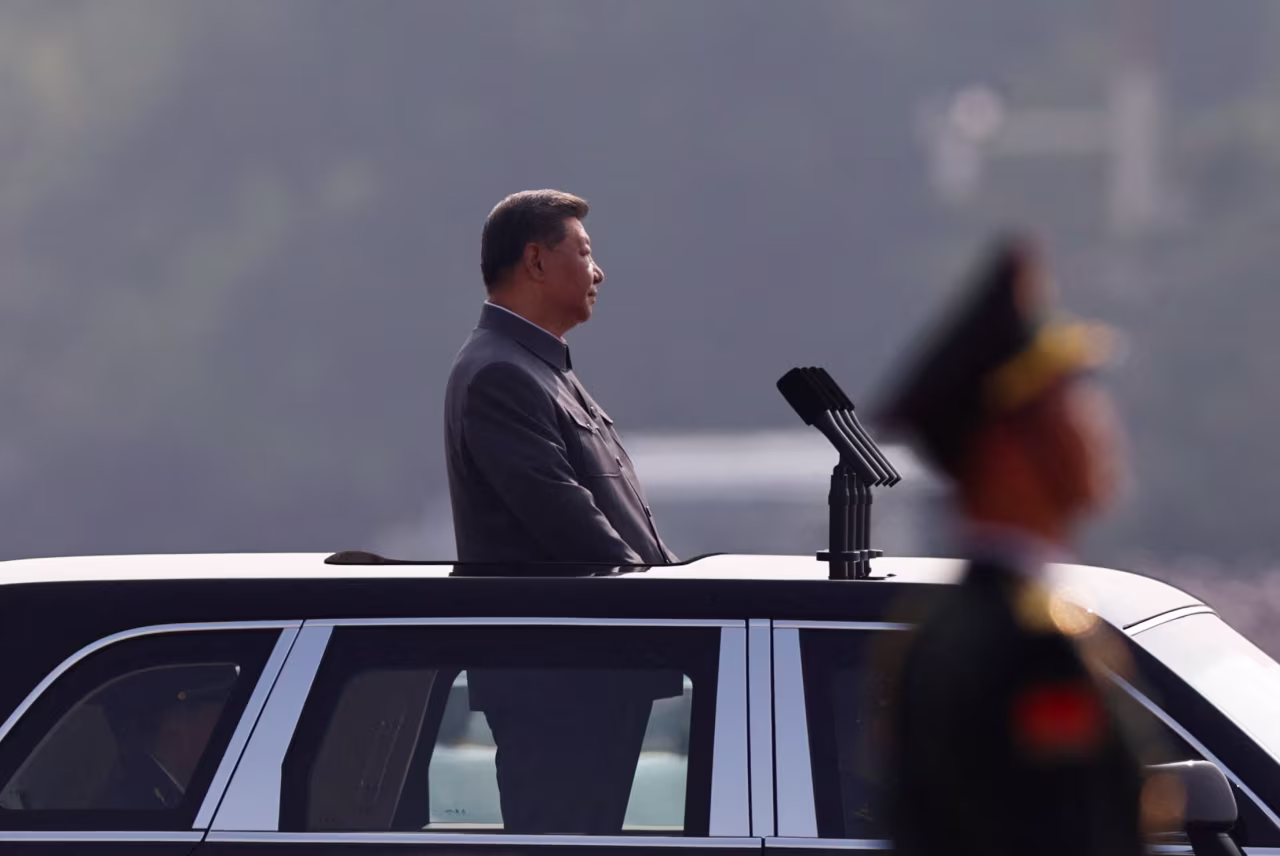 Chinese President Xi Jinping stands in a car during a military parade to mark the 80th anniversary of the end of World War Two, in Beijing, China, on September 3.