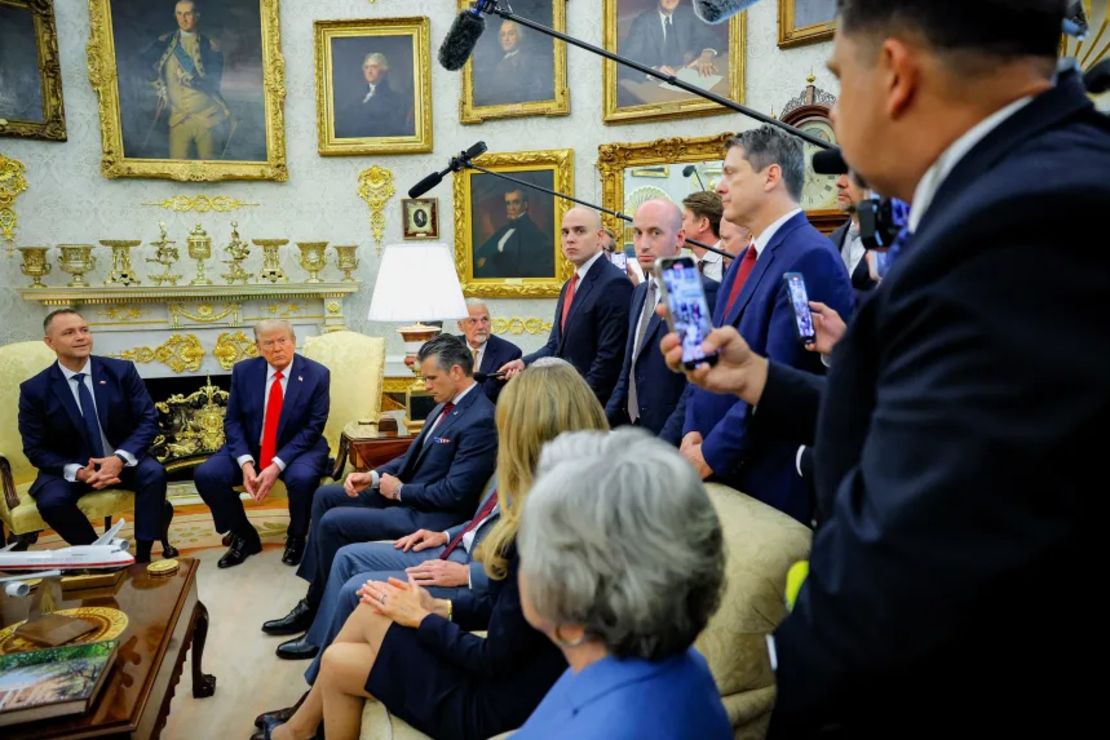 U.S. President Donald Trump and Poland's Karol Nawrocki speak during a meeting in the Oval Office on Wednesday.