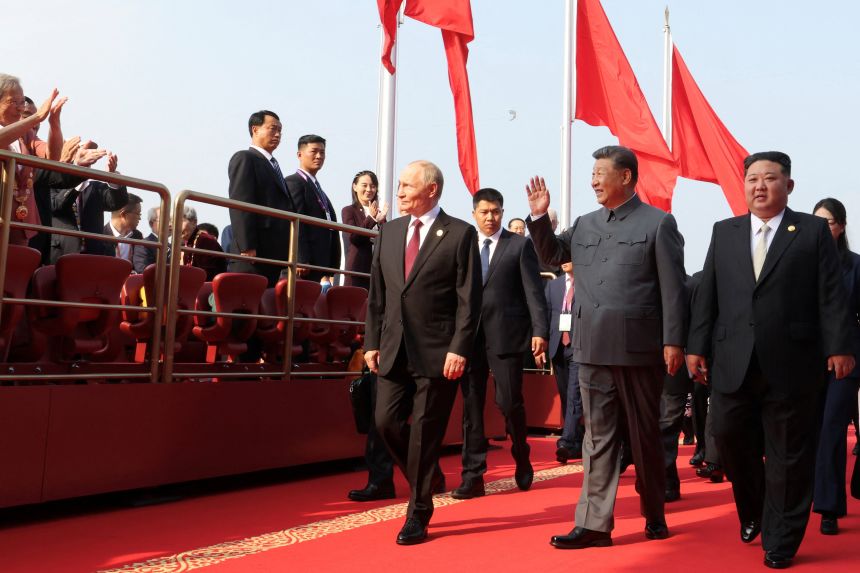 Russian President Vladimir Putin, Chinese leader Xi Jinping and North Korean leader Kim Jong Un arrive at the Tiananmen Gate for a military parade in Beijing on September 3, 2025.