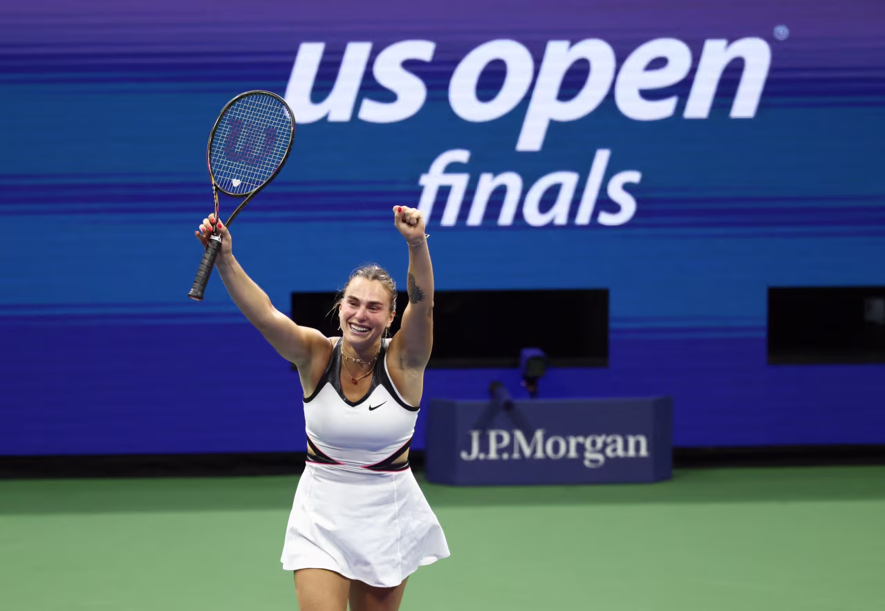Aryna Sabalenka celebrates after match point.