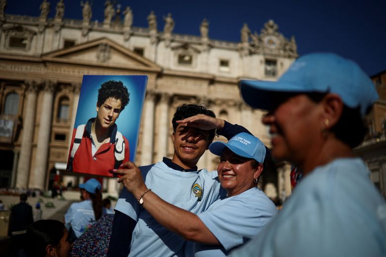 Pope Leo XIV holds a photograph of Carlo Acquis for the canoeing of Carlo Acquis, the first millennial-born Italian boy to become a Catholic saint in St. Peter's Square, Vatican on September 7, 2025.