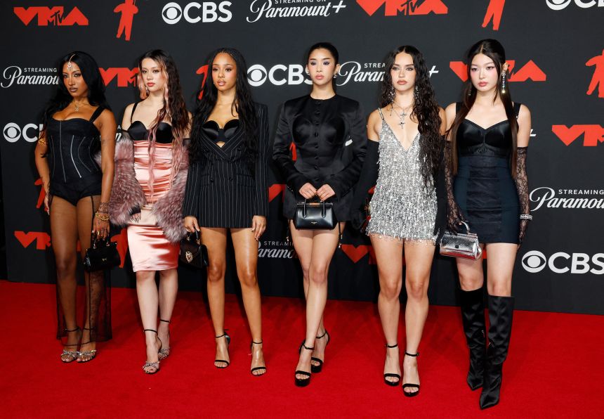 Katseye poses on the red carpet at the 2025 MTV Video Music Awards in Elmont, New York.