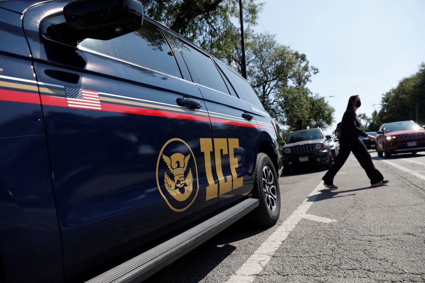An Immigration and Customs Enforcement vehicle is parked outside the Cook County Courthouse in Chicago on September 8.