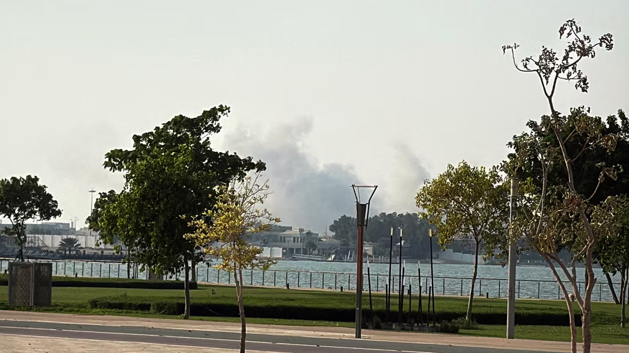 Smoke rises after several blasts were heard in Doha, Qatar, on Tuesday.