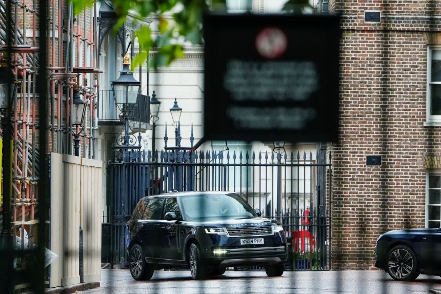 Prince Harry arrives at Clarence House Wednesday afternoon, inside the car.