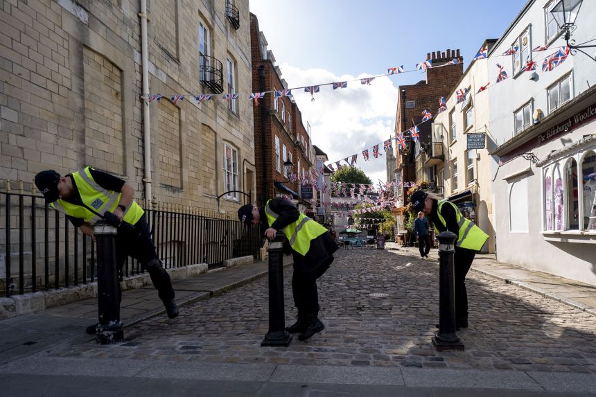 Thames Valley Police officers from their Specialist Search Unit carry out security searches in Windsor, Britain, on Friday, ahead of the state visit by US President Donald Trump.