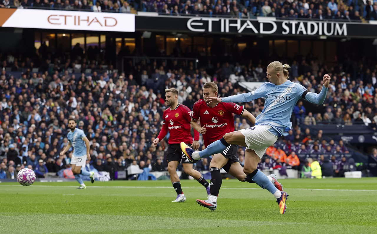 Manchester City's Erling Haaland shoots at goal during the match between City and United at the Etihad Stadium, Manchester, on September 14.