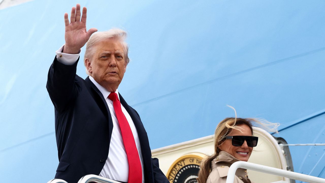 U.S. President Donald Trump and first lady Melania Trump board Air Force One as they depart for a state visit to Britain, at Joint Base Andrews, Maryland, U.S., September 16, 2025. REUTERS/Kevin Lamarque