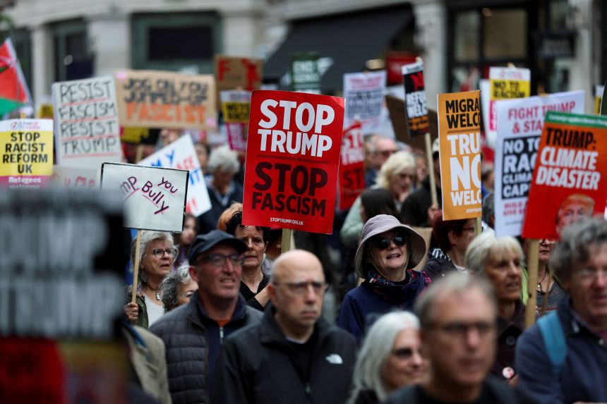 Demonstrators will hold placards at a 
