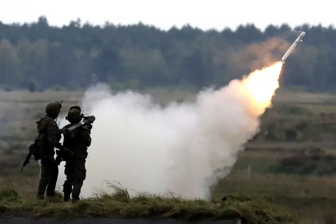 Polish soldiers fire from a portable air defense system during NATO military exercises at a firing range in Wierzbiny, Poland.