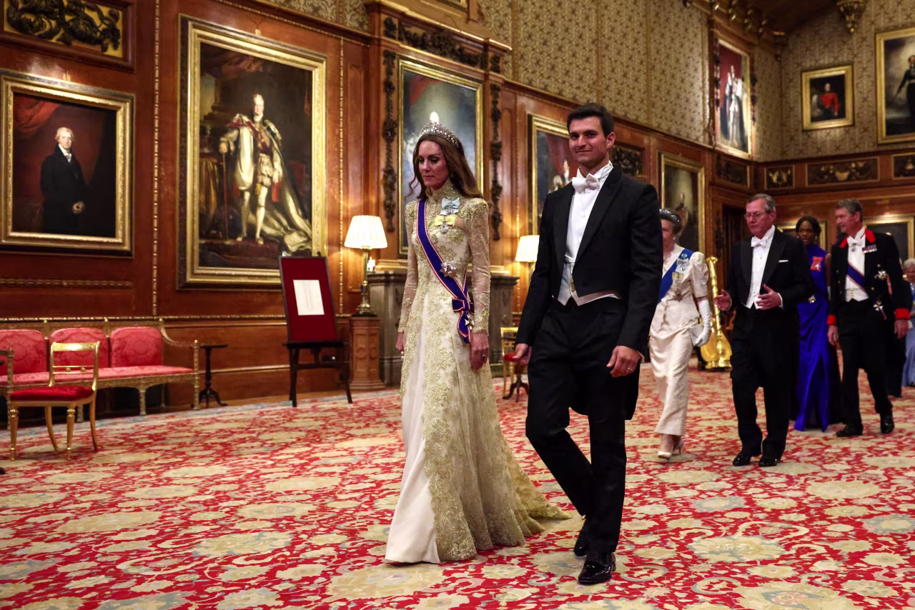 Britain's Catherine, Princess of Wales enters.