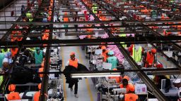 Kenyan workers prepare clothes for export at the New Wide Garment Export Processing Zone (EPZ) factory operating under the US African Growth and Opportunity Act (AGOA), in Kitengela, Kajiado County, Kenya on September 19, 2025.