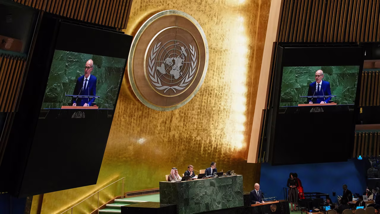 Luxembourg's Prime Minister Luc Frieden addresses delegates on Monday.