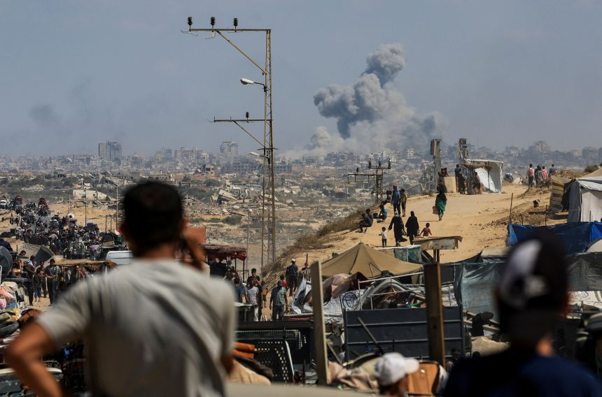 Smoke rises from an Israeli strike in the central Gaza Strip on Wednesday.