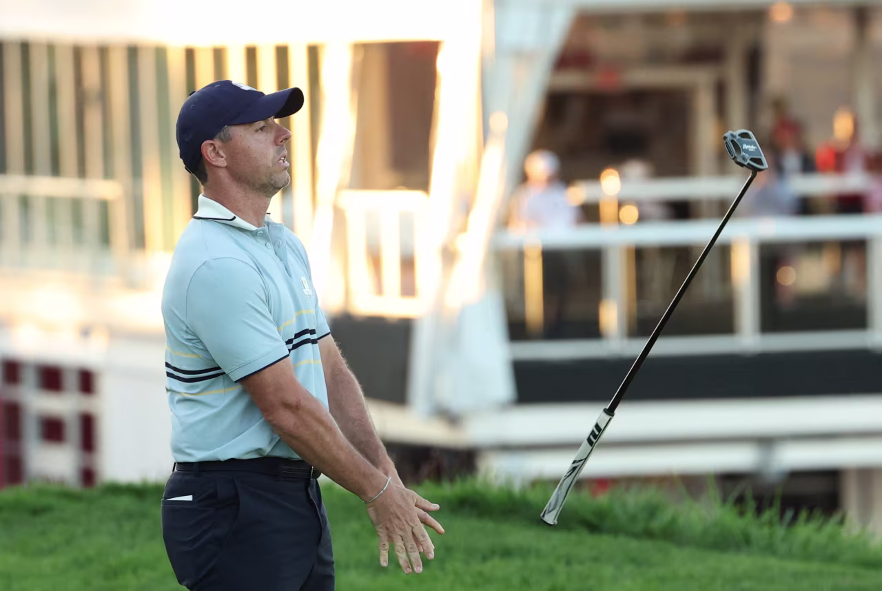 Rory McIlroy reacts after missing his putt on No. 18.