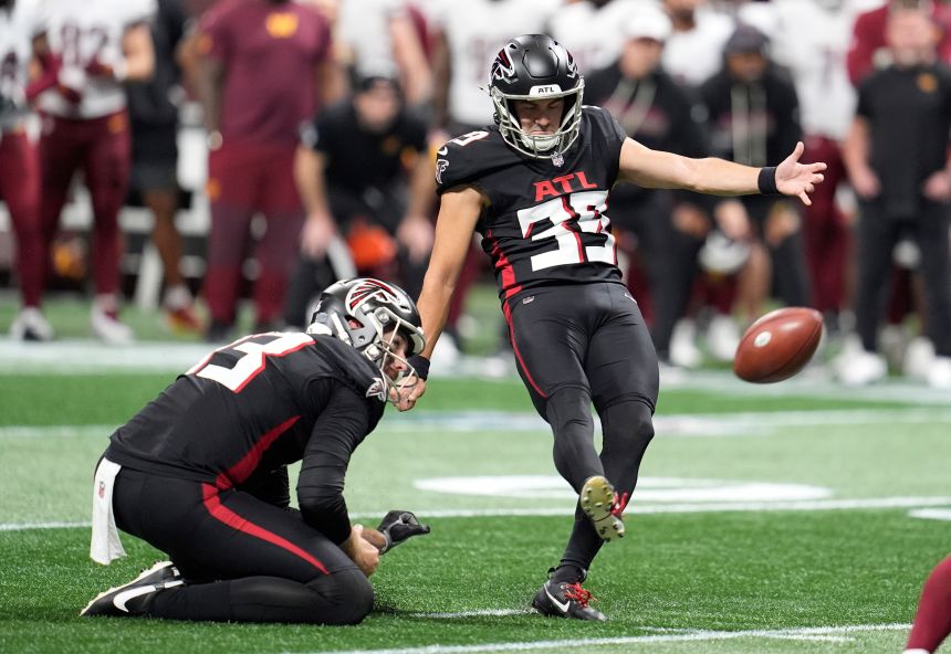 Atlanta Falcons kicker Parker Romo kicks a field goal during the second half against the Washington Commanders at Mercedes-Benz Stadium.