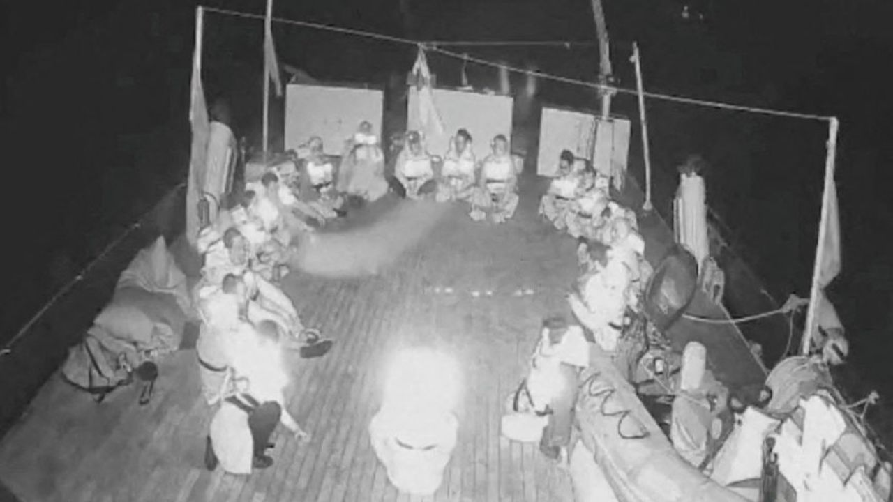 In this handout screenshot taken from live video footage, crew members can be seen sitting in a circle aboard the Gaza-bound "Alma" vessel on Wednesday.