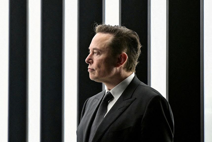 FILE PHOTO: Elon Musk attends the opening ceremony of the new Tesla Gigafactory for electric cars in Gruenheide, Germany, March 22, 2022. Patrick Pleul/Pool via REUTERS//File Photo